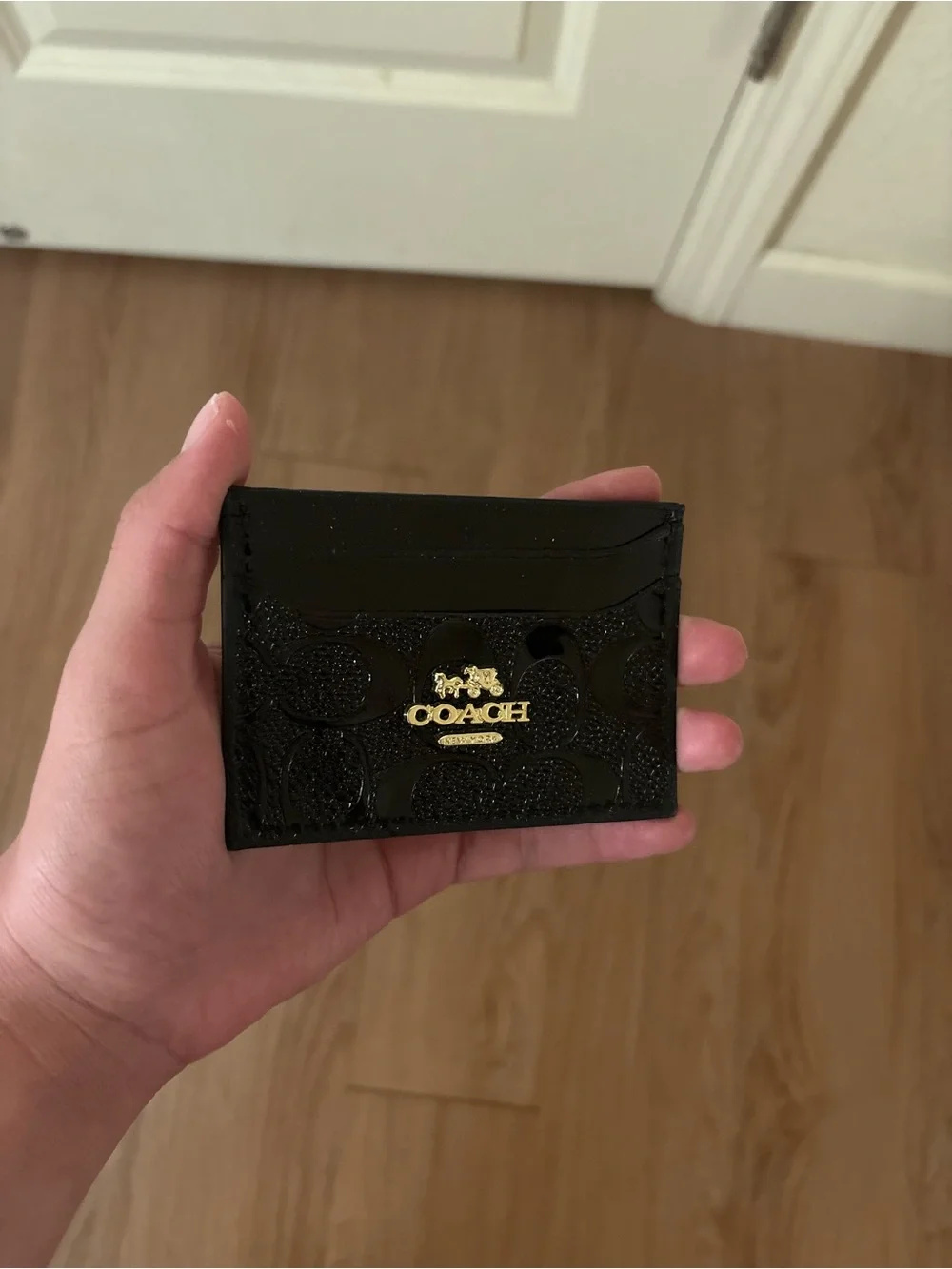 COACH Black Patent Leather Card Holder with Gold Logo